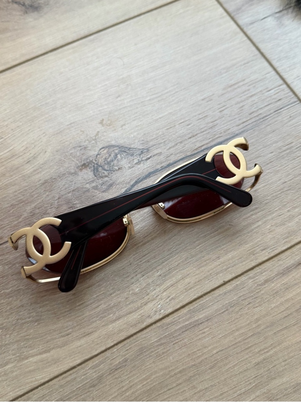 CHANEL Brown Frame Sunglasses with Gold CC Accents and Burgundy Lenses oval